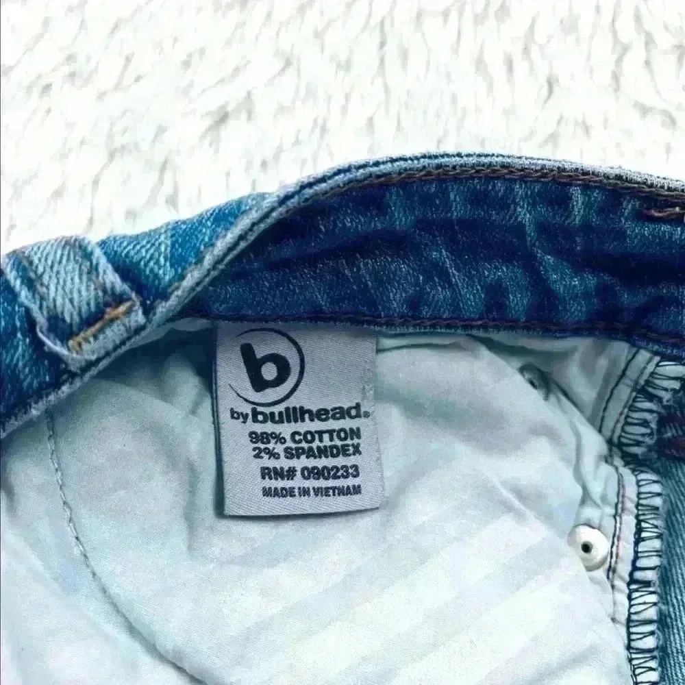 B By‎ Bullhead Med Wash Lowrise Distress Faded Cheeky Raw Hem Jean Shorts Size 9
